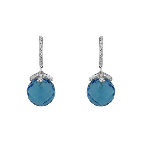 Diamond earrings with Topaz Wing Relaxation