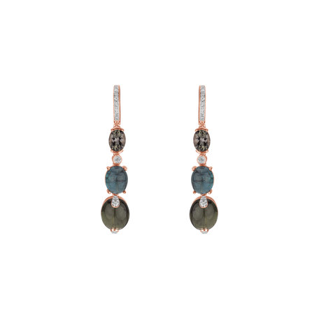 Diamond earrings and Tourmalíne Caesarean Courier