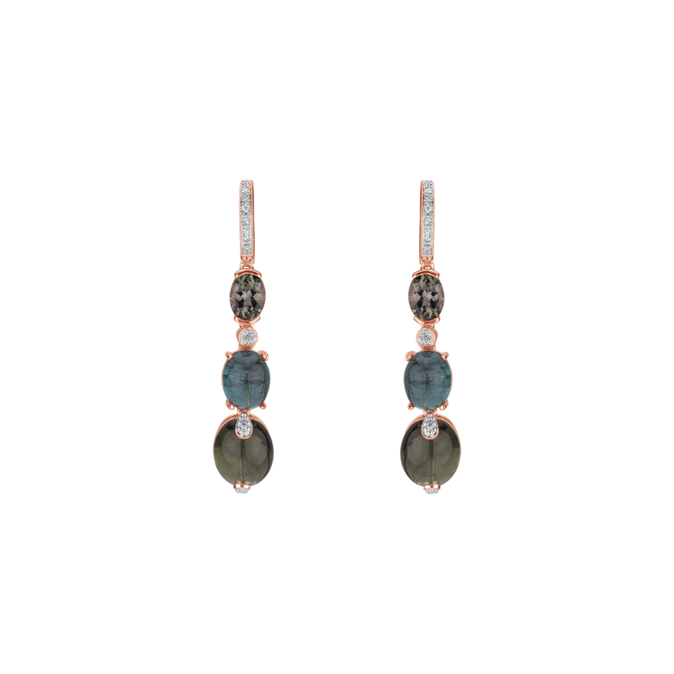 Diamond earrings and Tourmalíne Caesarean Courier
