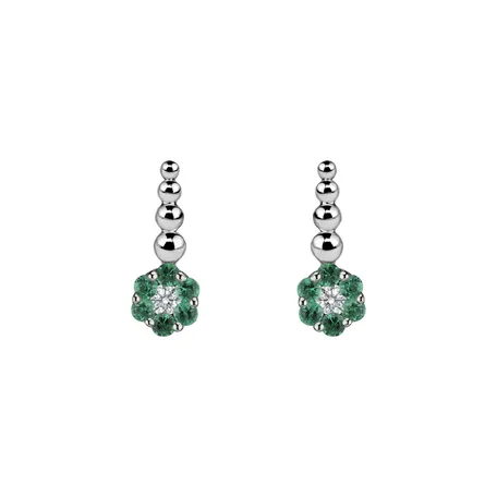 Diamond earrings and Emerald Mckenna
