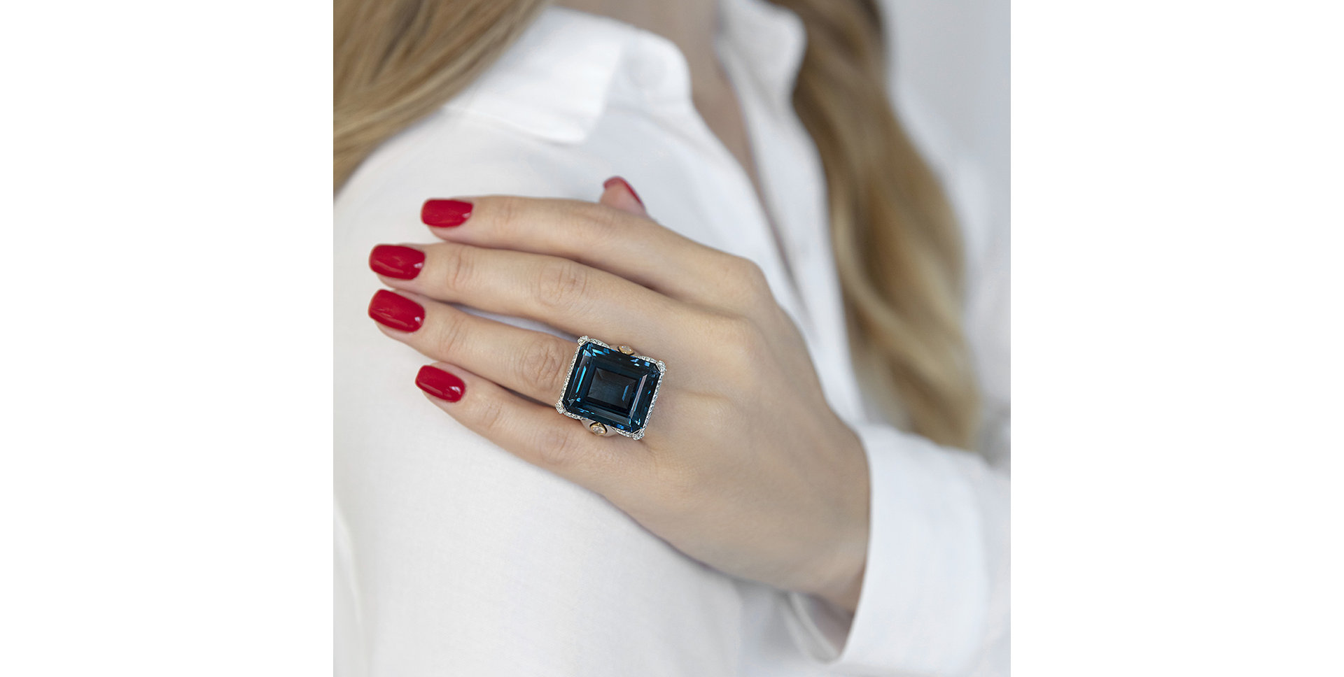 Diamond ring with Topaz Blue Rhapsody