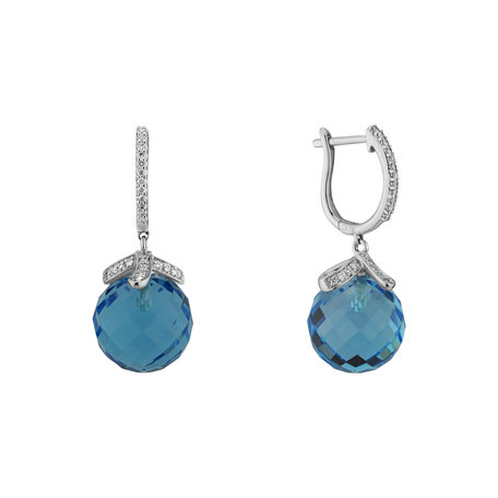 Diamond earrings with Topaz Wing Relaxation