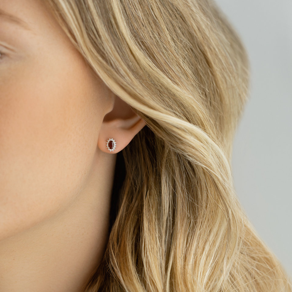 Diamond earrings with Ruby Princess