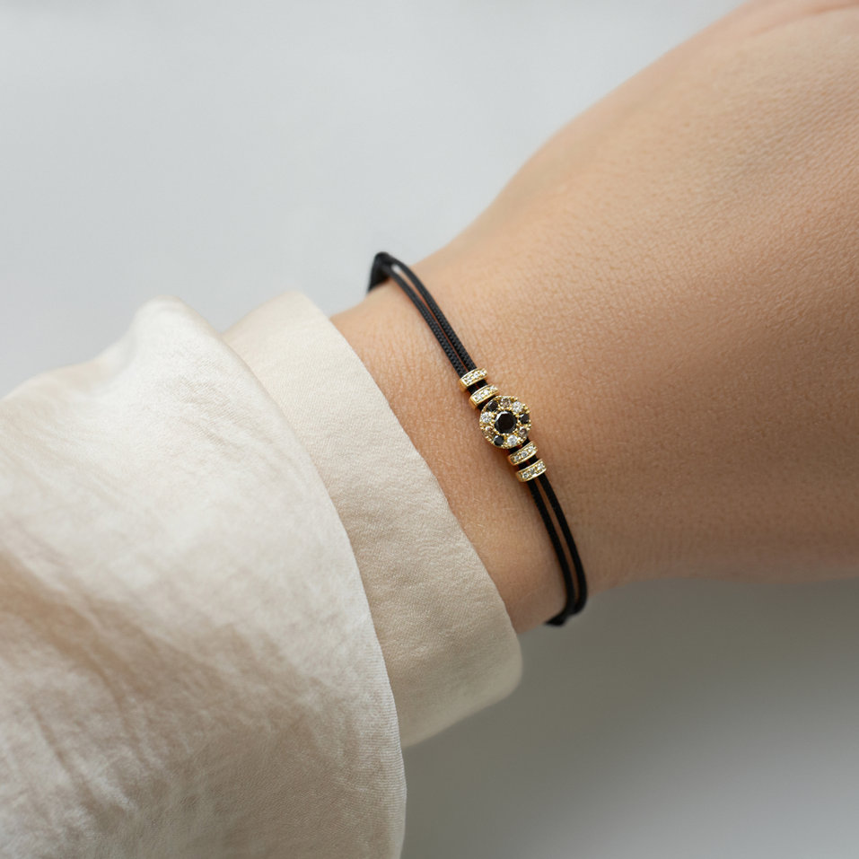 Bracelet with white, brown and black diamonds Shamballa