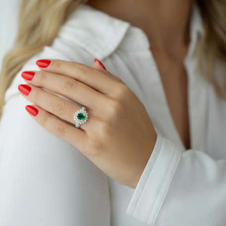 Diamond ring with Emerald Green Cabinet