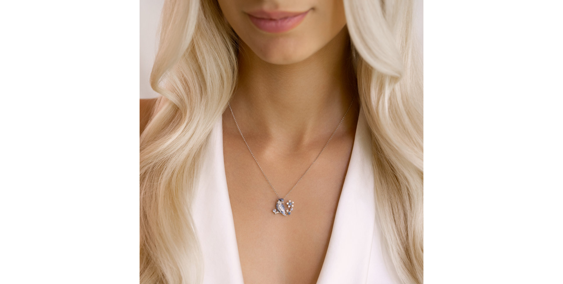 Pendant with black and white diamonds and Sapphire Paradise Calling
